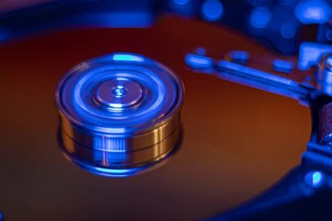 Computer hard drive without protective cover. Stock Photos