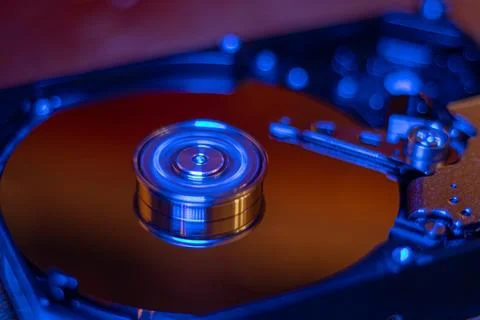 Computer hard drive without protective cover. Stock Photos