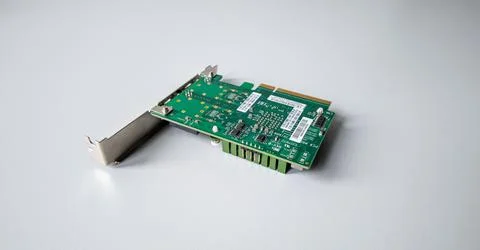 Computer hardware component displayed on a plain surface for technical Stock Photos