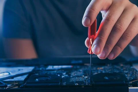 Computer hardware engineering. developer soldering electronic component Stock Photos