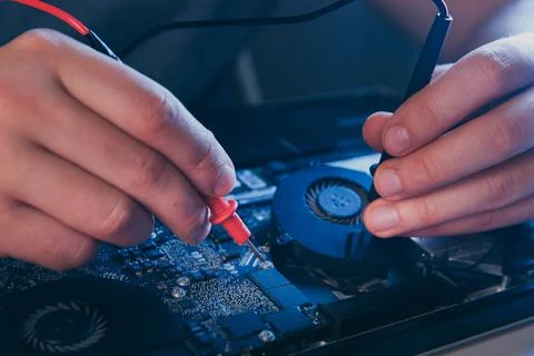 Computer hardware engineering. developer soldering electronic component Stock Photos