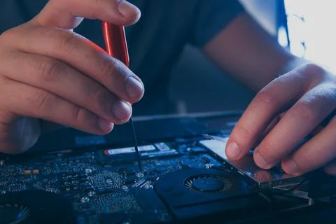 Computer hardware engineering. developer soldering electronic component Stock Photos