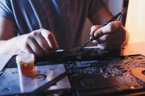 Computer hardware engineering. developer soldering electronic component 스톡 사진