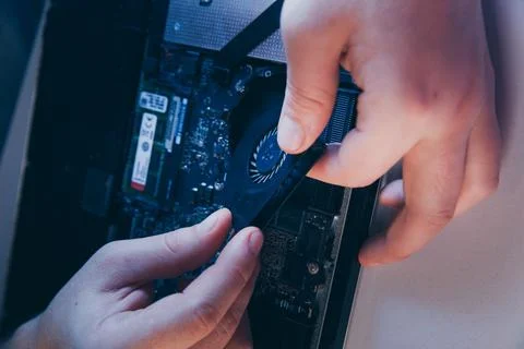 Computer hardware engineering. developer soldering electronic component Stock Photos