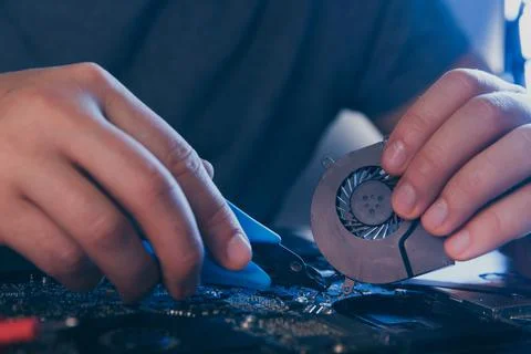 Computer hardware engineering. developer soldering electronic component Foto stock