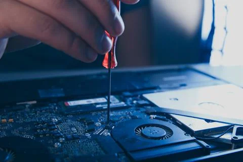 Computer hardware engineering. developer soldering electronic component Stock Photos