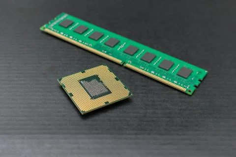 Computer hardware, processor and RAM are on the black table Stock Photos