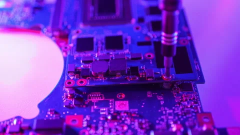 Computer hardware repair with screwdriver tool technology Stock Footage 336113699