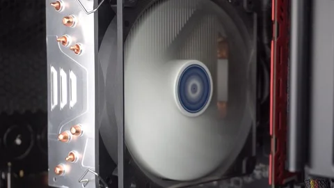 Computer Hardware With Running Fans, Close Up of CPU Heat Sink Stock Footage 98509392