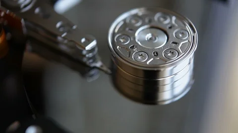 Computer HDD hard drive at work. Hard disk rotation. Macro shooting Stock Footage 118054417