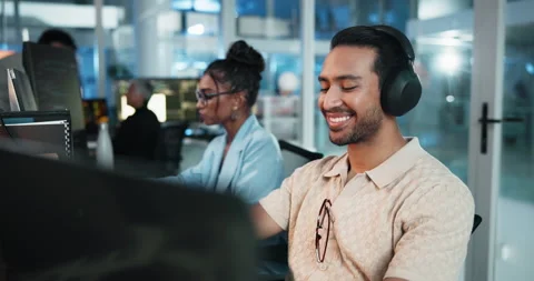 Computer, headphones and smile of programmer man at desk in office as graphic Stock Footage 309036859