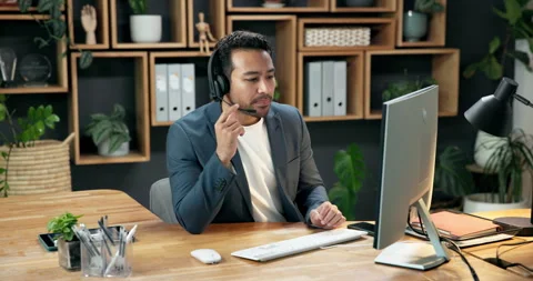 Computer, headset and man in office for telemarketing, lead generation or eco Stock Footage 342334264