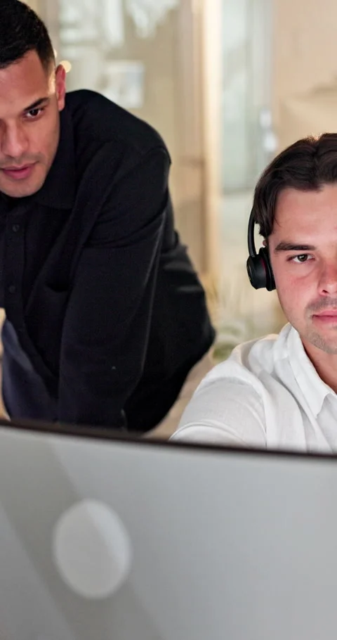 Computer, headset and supervisor with man in call center for feedback, support Stock Footage 335804820