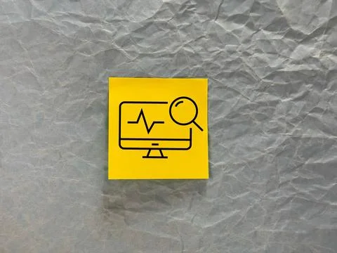 A computer icon from a medical post is painted on office paper. medical care  Stock Photos