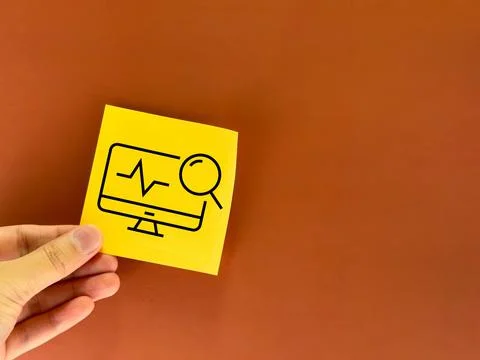 A computer icon from a medical post is painted on office paper. medical care  Stock Photos
