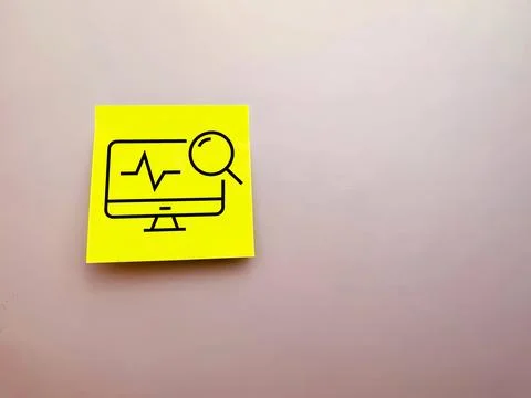 A computer icon from a medical post is painted on office paper. medical care  Foto stock