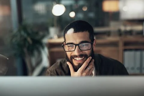 Computer, idea and smile with designer man in office at night for website coding 写真素材