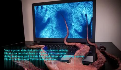 Computer infected by virus software. Cyber security concept. Stock Photos
