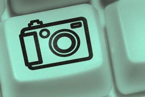 Computer key with camera sign Stock Photos