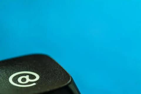 Computer key with e-mail icon Stock Photos