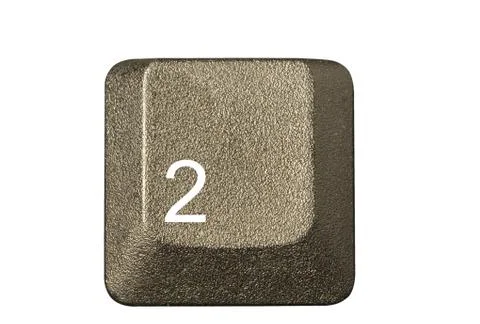 Computer key in a keyboard with letter, number and symbols Stock Photos