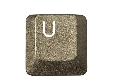 Computer key in a keyboard with letter, number and symbols Stock Photos