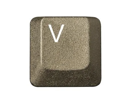 Computer key in a keyboard with letter, number and symbols Stock Photos