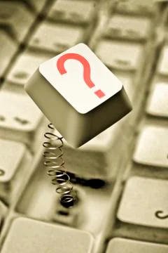 Computer key springing up with question mark Illustrazione stock
