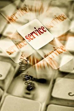 Computer key springing up with word service Stock Illustration