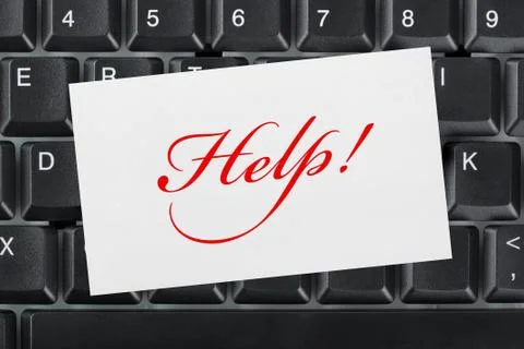 Computer keyboard and card Help Stock Photos