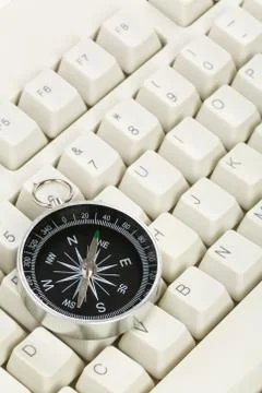 Computer Keyboard and Compass Stock Photos