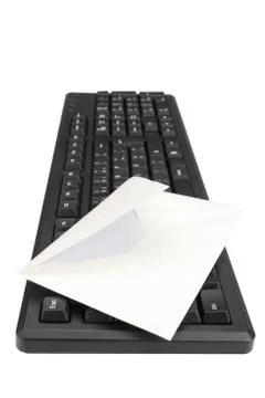 Computer keyboard and envelope for mail. On a white background. Stock Photos
