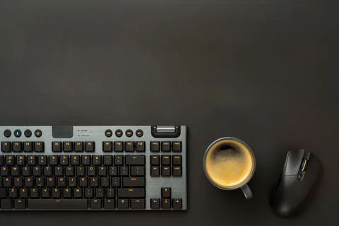 Computer keyboard and mouse on black background Foto stock