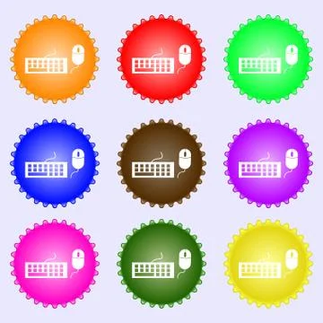 Computer keyboard and mouse Icon. A set of nine different colored labels. Vec Illustrazione stock