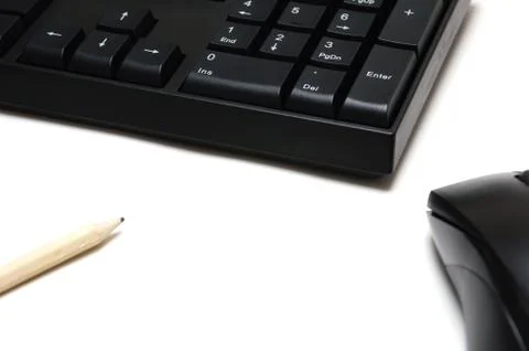 Computer keyboard and mouse, pencil isolated on white background Stock Photos