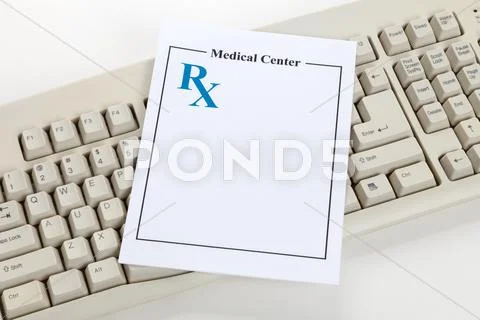 Computer Keyboard and Prescription Stock Photos