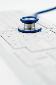 Computer keyboard and stethoscope. Foto stock