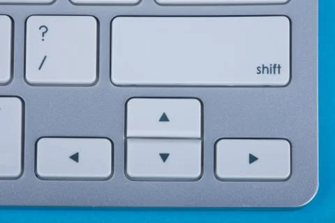 Computer keyboard on blue background Stock Photos