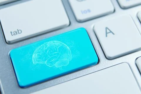 Computer keyboard with brain icon - business and education concept. Selecti.. Stock Photos