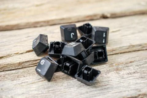 Computer keyboard buttons on old wood background Foto stock