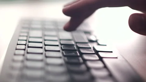 Computer keyboard. The camera is in motion - on dolly Stock Footage 87050529