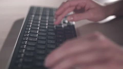 Computer keyboard. The camera is in motion - on dolly Stock-Footage 87348706
