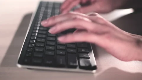 Computer keyboard. The camera is in motion - on dolly Stock-Footage 87349632