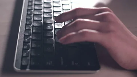 Computer keyboard. The camera is in motion - on dolly Stock Footage 87353767