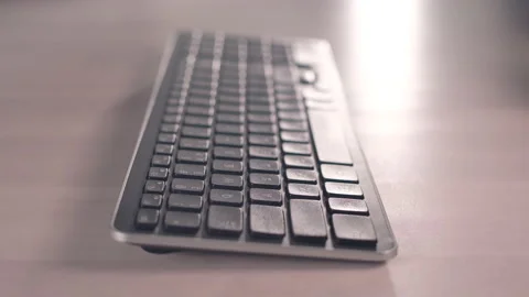 Computer keyboard. The camera is in motion - on dolly Stock Footage 87356000