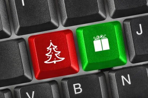 Computer keyboard with Christmas keys Stock Photos