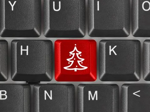 Computer keyboard with Christmas tree key Foto stock