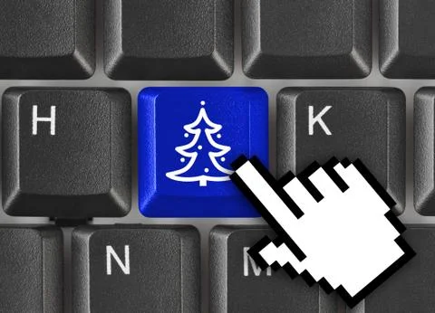 Computer keyboard with Christmas tree key Stock Photos