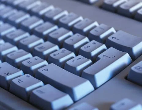 Computer keyboard close-up. focused on 'enter' key Stock Photos