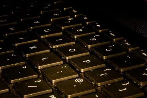 Computer Keyboard Closeup While Key Are Being Pushed Stock Photos